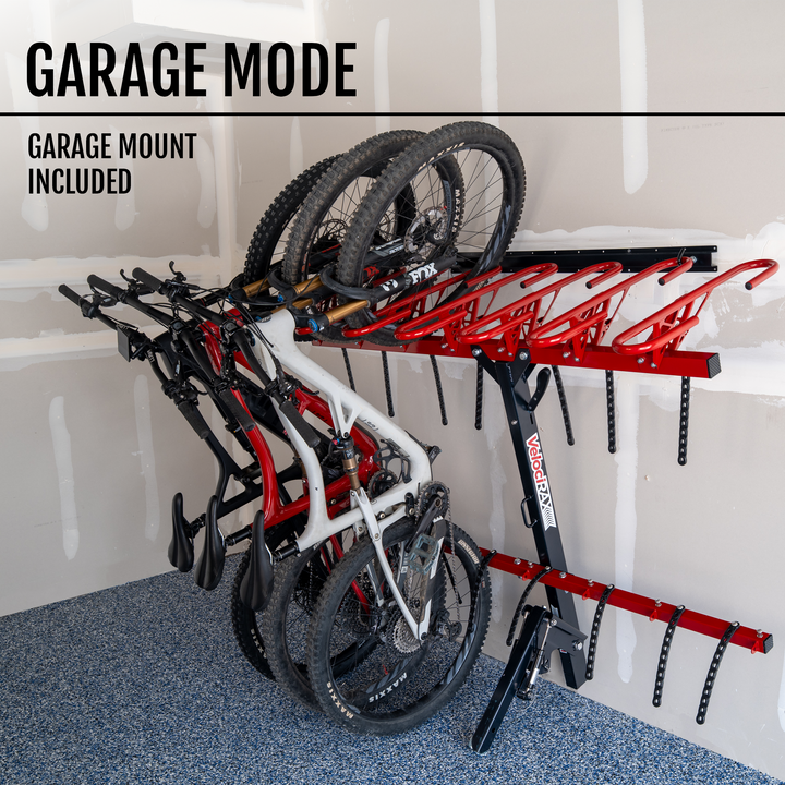 Bicycle rack holding multiple bicycles with 'Garage Mode' text above.